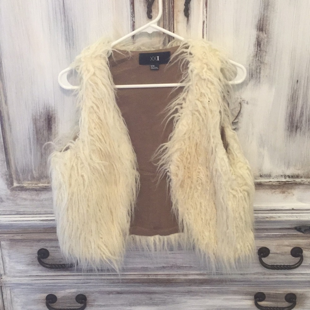 cream colored vest
